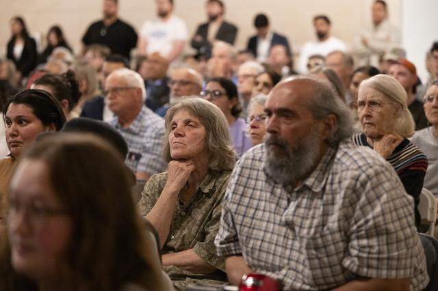 Voters listen during a congressional candidate forum for CA District 7 at Coloma Center in Sacramento on Thursday, April 2, 2026.