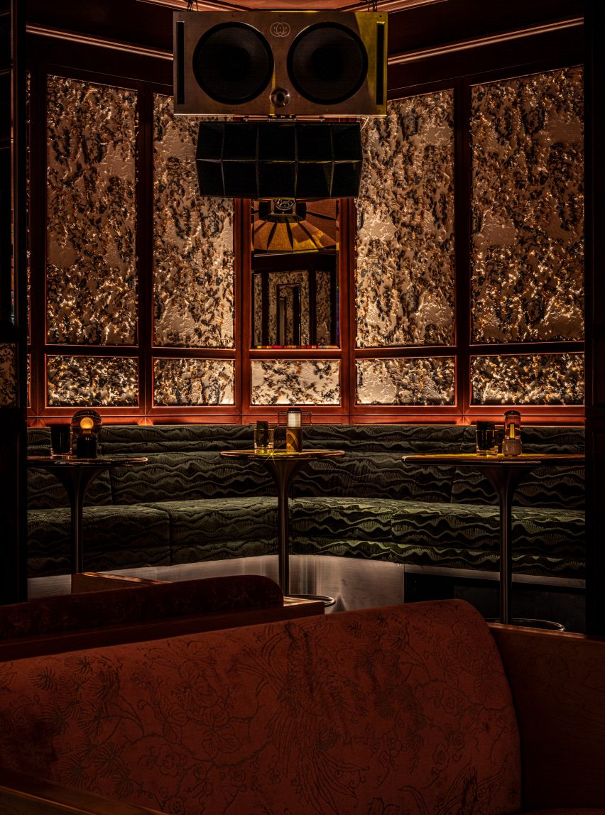 Green chaise lounge inside Dragon-i