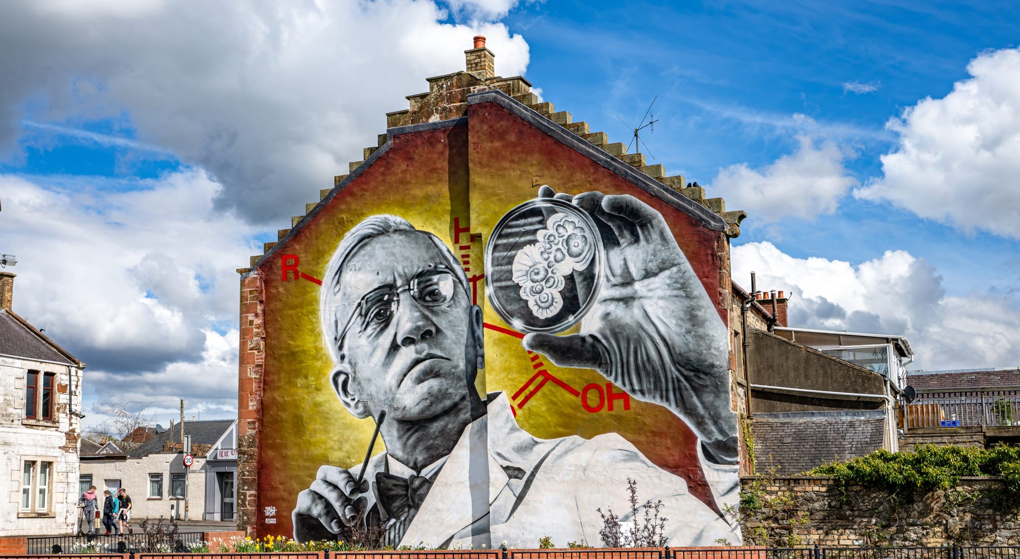 Alexander Fleming's Rogue One mural examining biological specimens