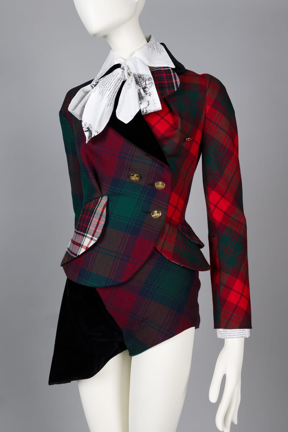 Fashion clothing featuring a plaid blazer and shorts combination